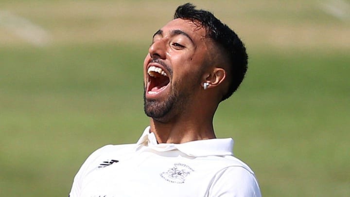 Singh Dale celebrates a wicket during his impressive spell for Gloucestershire