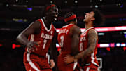 Alabama forward Taylor Bol Bowen (7), Alabama guard Latrell Wrightsell Jr. (3) and Alabama guard Houston Mallette (95) celebrating during the game against Saint John's at Madison Square Garden in New York, NY on Saturday, Nov 8, 2025.