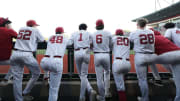 The Alabama baseball team in its dugout.