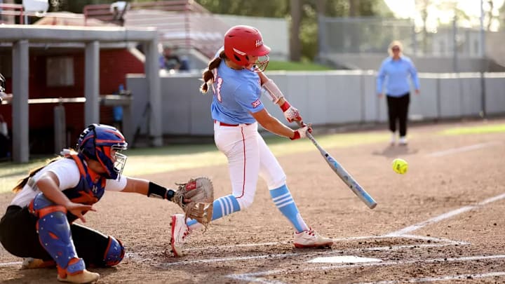 Houston's Isabel Cintron (at bat)