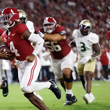 Alabama Quarterback Jalen Milroe (4) runs in a touchdown against University of South Florida at Bryant-Denny Stadium in Tuscaloosa, AL on Saturday, Sep 7, 2024. 