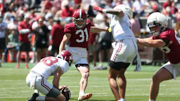 Alabama Punter Blake Doud (38) holds while Alabama Kicker Conor Talty (31) kicks a field goal during A-Day at Bryant-Denny Stadium in Tuscaloosa, AL on Saturday, Apr 12, 2025.