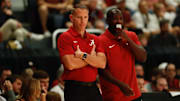 Alabama basketball coach Nate Oats and Alabama basketball assistant coach Preston Murphy talk during the game against FSU during Ballin in Boutwell at Boutwell Auditorium in Birmingham, AL on Thursday, Oct 16, 2025.