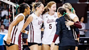 Mississippi State Middle Blocker Gha'Naye Whitfield-Moss (#22), Mississippi State Outside Hitter Bernardita Aguilar (#1), Mississippi State Setter Erin Kline (#5), Mississippi State Defensive Specialist Mary Neal (#8) and Mississippi State Defensive Specialist McKenna Yates (#4) during the match between the Texas A&M Aggies and the Mississippi State Bulldogs at the Newell-Grissom Building in Starkville, MS.