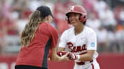 Alabama Assistant Coach Kayla Braud celebrates with Alabama Softball Player Salen Hawkins (47) against Oklahoma in the NCAA Norman Super Regional at Love's Field in Norman, OK on Saturday, May 24, 2025.
