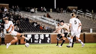Midfielder Cooper Flax (18) fires a low-driven shot to equalize for Wake Forest in the 80th minute against Wofford on Tuesday night at Spry Stadium in Winston-Salem, North Carolina.