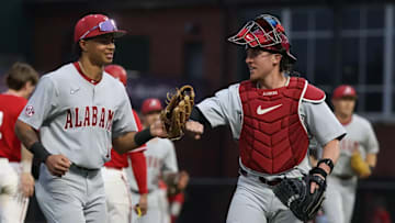 Alabama baseball players Justin Lebron (1) and Will Plattner (17).