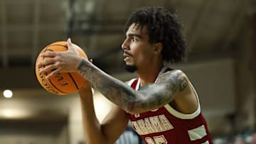 Alabama guard Houston Mallette (95) shoots the ball against North Dakota at Betty Engelstad Sioux Center in Grand Forks, ND on Wednesday, Dec 18, 2024.