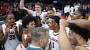 The Alabama Basketball Team celebrates after the game against Saint Mary's at Rocket Arena in Cleveland, OH on Sunday, Mar 23, 2025.