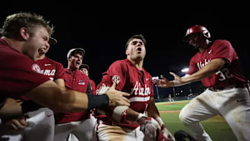 Coleman Mizell (15) celebrates with teammates.