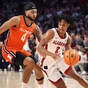 Alabama guard Aden Holloway (2) drives the paint against Illinois at Legacy Arena at BJCC in Birmingham, AL on Wednesday, Nov 20, 2024.