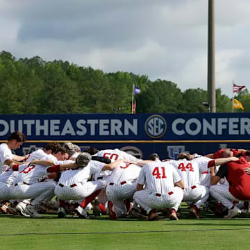 An Alabama baseball team huddle at the SEC Tournament.
