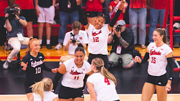 Nebraska volleyball players celebrate during a 4-0 win over South Dakota State at Ord High School on May 3, 2025.