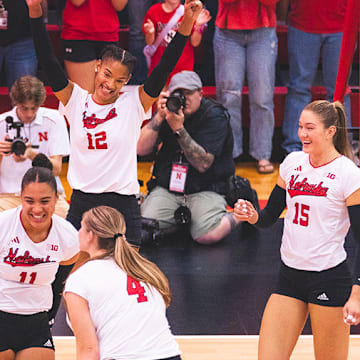 Nebraska volleyball players celebrate during a 4-0 win over South Dakota State at Ord High School on May 3, 2025.