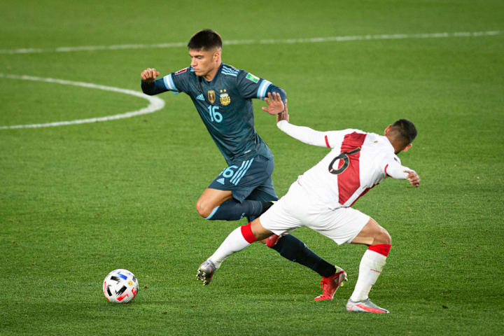 Joaquin Correa and Miguel Trauco of Peru in action during...