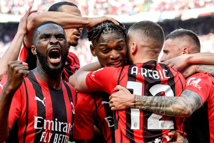 Rafael Leao of AC Milan (c) celebrates with Fikayo Tomori,...