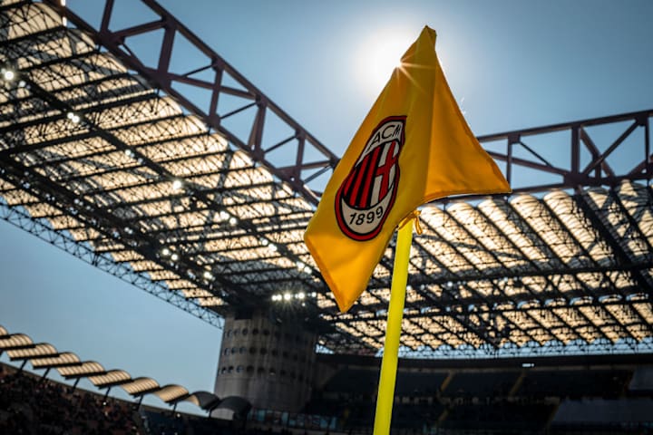 A corner flag bearing AC Milan logo crest in seen prior to...