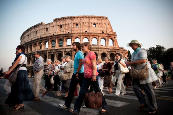 Tourists walking in Rome, Italy.