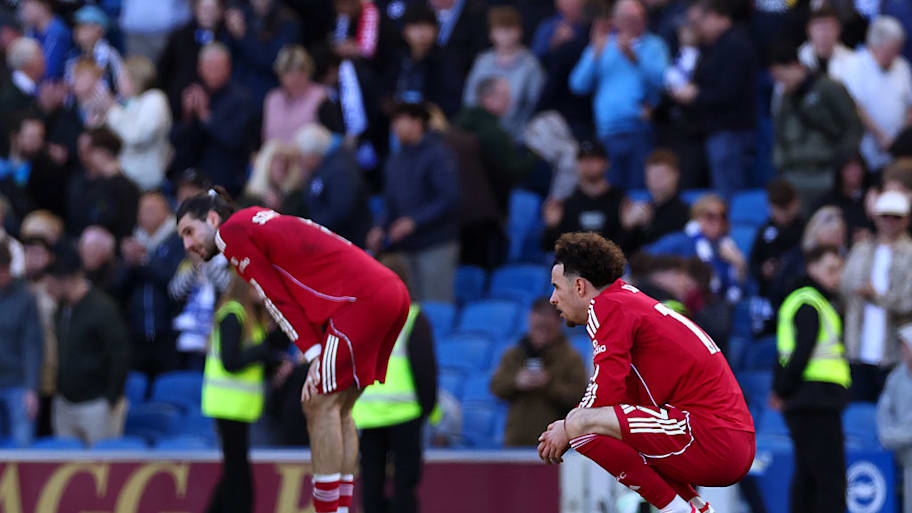 Liverpool players dejected after Brighton defeat