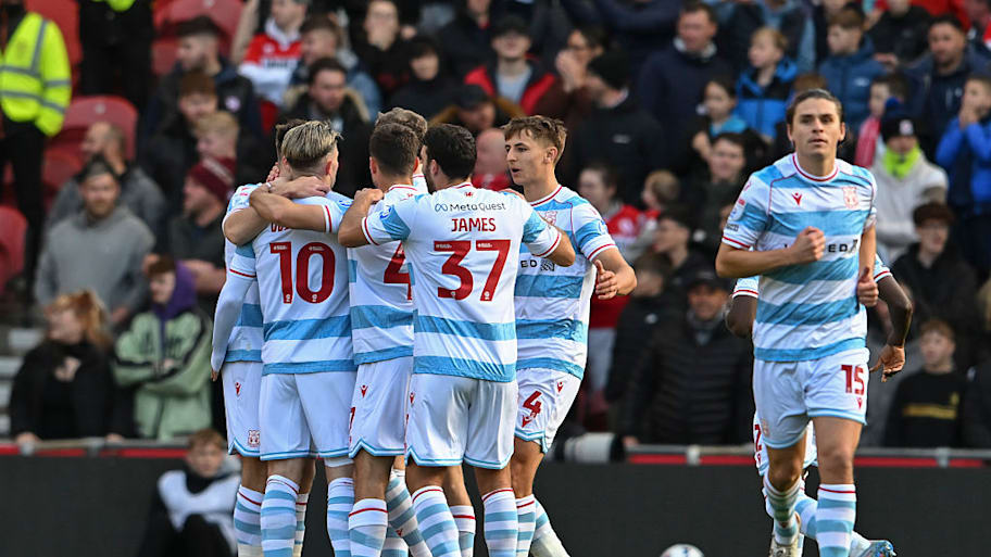 Wrexham celebrate after taking the lead against Middlesbrough.