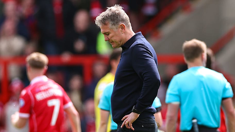 Wrexham manager Phil Parkinson reacts to Middlesbrough draw.