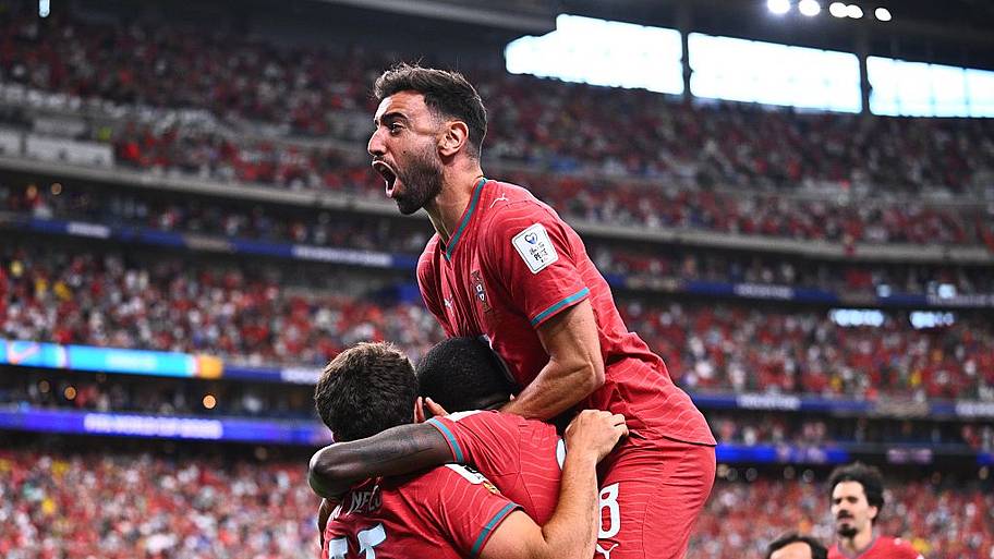 Bruno Fernandes and Portugal’s players celebrate.