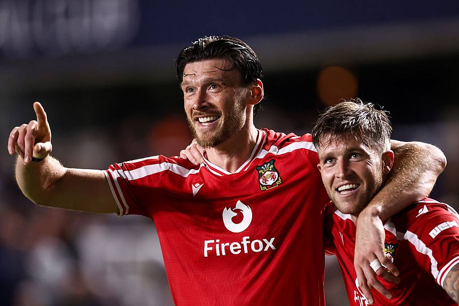 Kieffer Moore of Wrexham celebrates their second goal with Josh Windass of Wrexham during the Sky Bet Championship 2026/27.