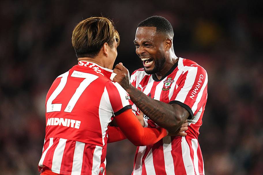 Southampton’s Kuryu Matsuki and Cyle Larin celebrate their side’s third goal.