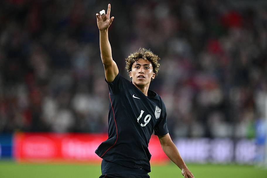 Hall celebrating goal.
