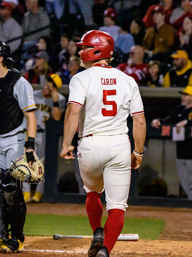 Josh Caron runs home to score the go ahead run on Cole Evans’ double. 
