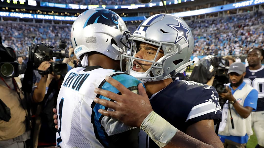 CHARLOTTE, NC - SEPTEMBER 09: Dak Prescott #4 of the Dallas Cowboys greets Cam Newton #1 of the Carolina Panthers after their game at Bank of America Stadium on September 9, 2018 in Charlotte, North Carolina.