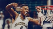 Forward Dennis Scott cuts the net down after beating No. 6 Minnesota to make the 1990 Final Four. 