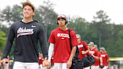 Alabama shortstop Justin Lebron arrives in Hoover with teammates.
