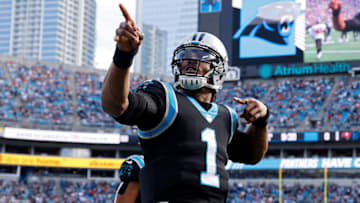 CHARLOTTE, NORTH CAROLINA - DECEMBER 26: Cam Newton #1 of the Carolina Panthers reacts after running for a first down during the first half in the game against the Tampa Bay Buccaneers at Bank of America Stadium on December 26, 2021 in Charlotte, North Carolina.