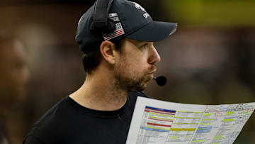 NEW ORLEANS, LOUISIANA - DECEMBER 1: Klint Kubiak, offensive coordinator for the New Orleans Saints, calls a play from the sideline during the second half of a game against the Los Angeles Rams at the Caesars Superdome on December 1, 2024 in New Orleans, Louisiana.