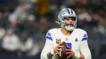 DALLAS, TX - JANUARY 14: Dak Prescott #4 of the Dallas Cowboys drops back to pass against the Green Bay Packers during the second half of the NFC Wild Card playoff game at AT&T Stadium on January 14, 2024 in Dallas, Texas.