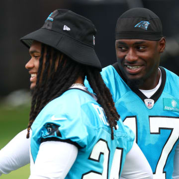 CHARLOTTE, NORTH CAROLINA - JUNE 04: Jonathon Brooks #24 and Xavier Legette #17 of the Carolina Panthers attend Carolina Panthers OTA Offseason Workout on June 04, 2024 in Charlotte, North Carolina.