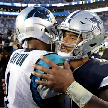 CHARLOTTE, NC - SEPTEMBER 09: Dak Prescott #4 of the Dallas Cowboys greets Cam Newton #1 of the Carolina Panthers after their game at Bank of America Stadium on September 9, 2018 in Charlotte, North Carolina.