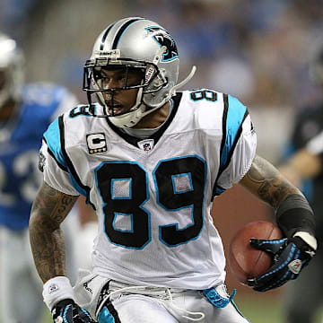 4 Nov 2001 : Steve Smith #89 of the Carolina Panthers is stopped by the Miami Dolphins defense during the game at Pro Player Stadium in Miami, Florida. DIGITAL IMAGE. 