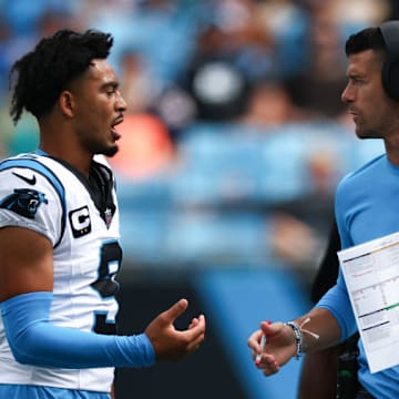 CHARLOTTE, NORTH CAROLINA - SEPTEMBER 15: Quarterback Bryce Young #9 talks with head coach Dave Canales of the Carolina Panthers talks with at Bank of America Stadium on September 15, 2024 in Charlotte, North Carolina.