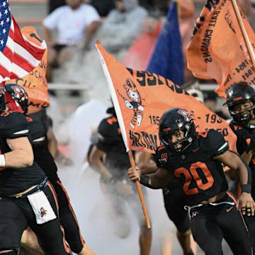 Massillon players run out of the tunnel prior to their game against Bergen Catholic on Friday, September 6, 2024.