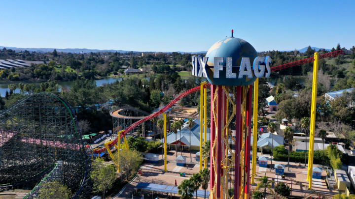 A Six Flags logo over one of its parks.