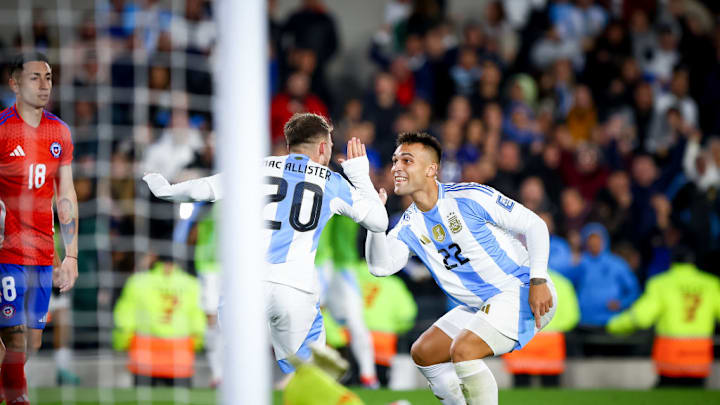 Alexis Mac Allister of Argentina (L) and Lautaro Martinez of...