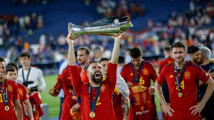 Dani Carvajal of Spain lifts the UEFA Nations League trophy...