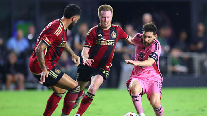Lionel Messi, Dax McCarty, Derrick Williams