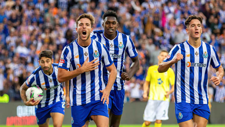 Nico Gonzalez (L) of FC Porto celebrates a goal with his...