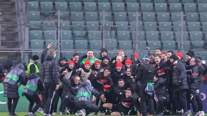 Spartak Moscow team pose for a group photo after the UEFA...