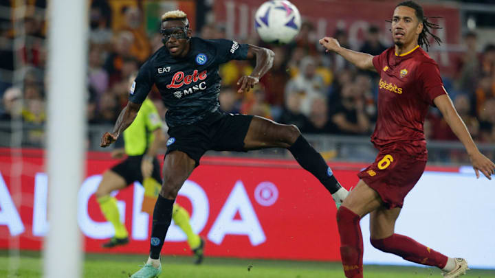 SSC Napoli's Nigerian striker Victor Osimhen kicks to score...
