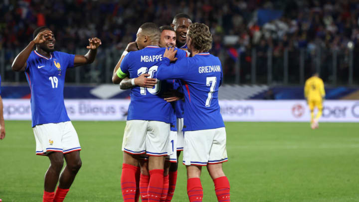 Jonathan Clauss, Kylian Mbappe, Antoine Griezmann