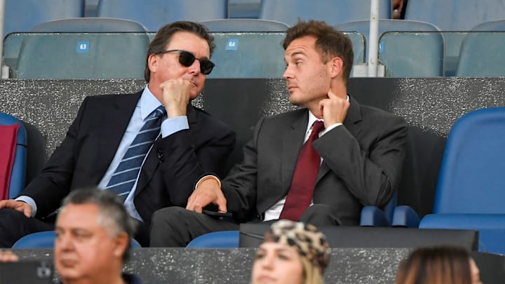 AS Roma president Dan Friedkin and his son Ryan talk during...